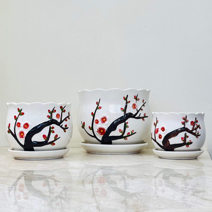 Artistic floral ceramic plant container set