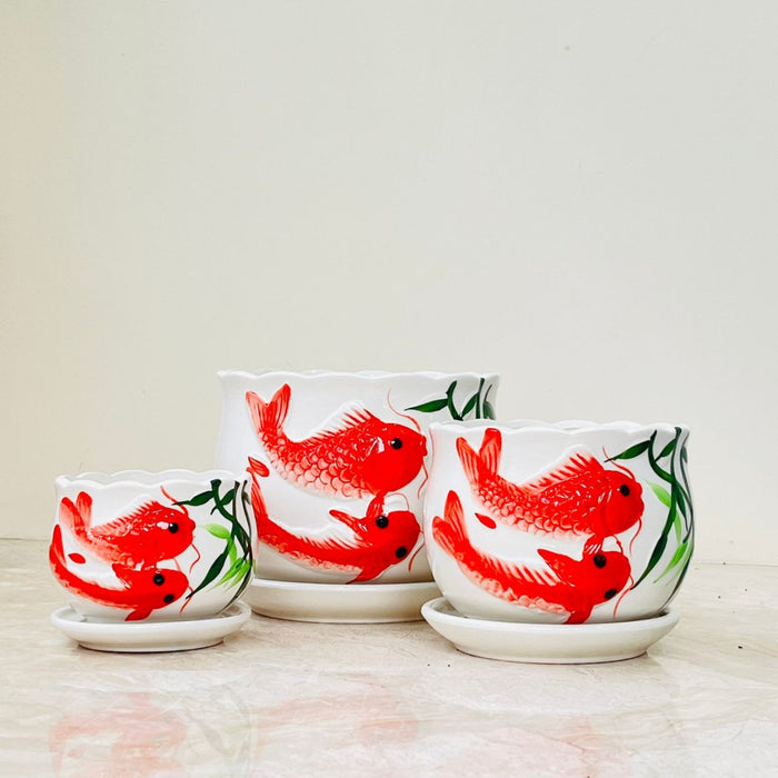 Artistic koi fish ceramic planters in three sizes