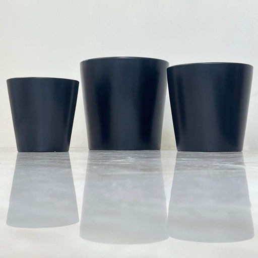 Set of black minimalist ceramic pots in three sizes