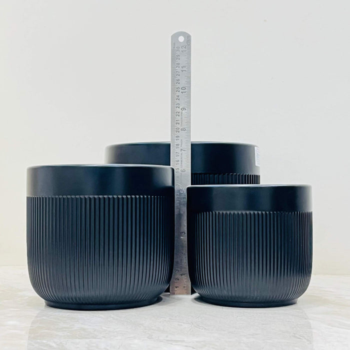 Modern black plant pots in three sizes