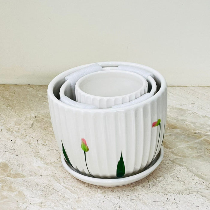 Blossom Breeze ceramic pot set with fluted design