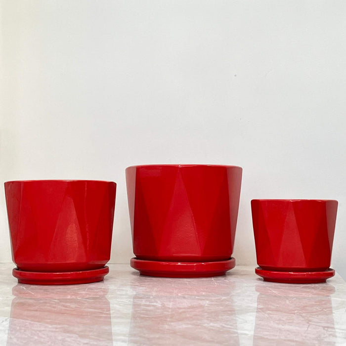 Glossy red ceramic planters in three different sizes