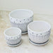 Elegant ceramic pots with vertical stripes and polka dots