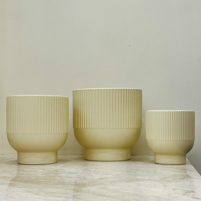 Contemporary beige ceramic plant holder set