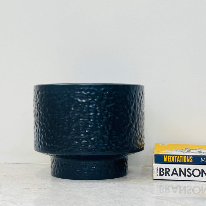 Dark blue hammered ceramic planter with pedestal base