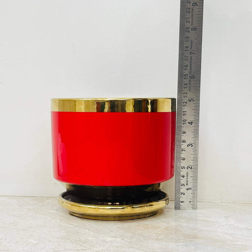 Glossy red and gold plant pot