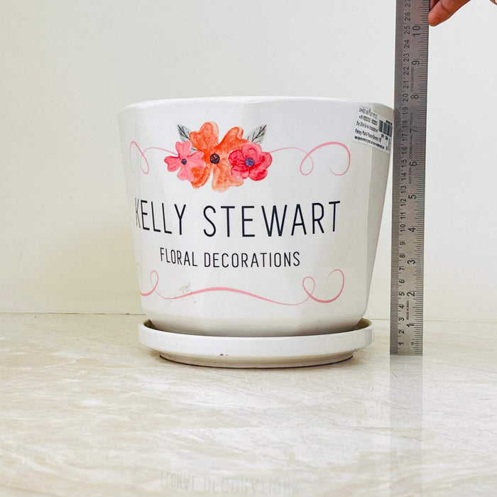 Floral design ceramic pot set with 'Kelly Stewart' branding