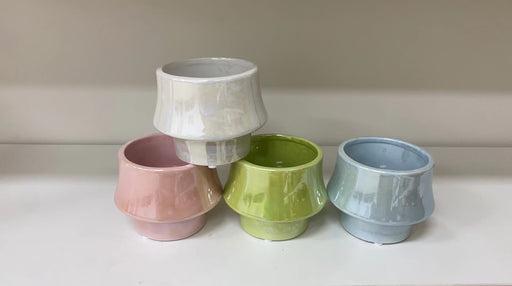 Stylish pastel ceramic planters with flared design