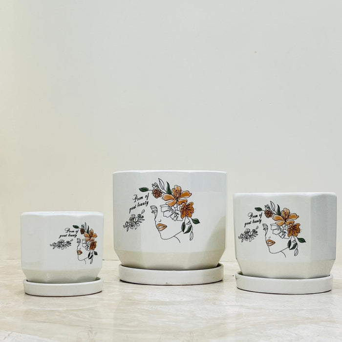 Floral Muse ceramic pot set with line art face design