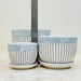 Three-piece ceramic planter set with matching saucers