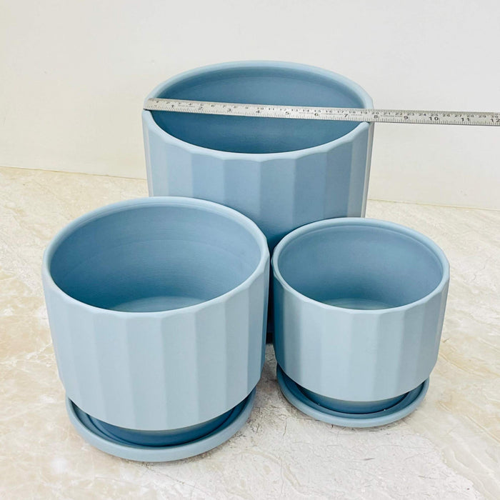 Elegant blue ceramic pots for indoor plants