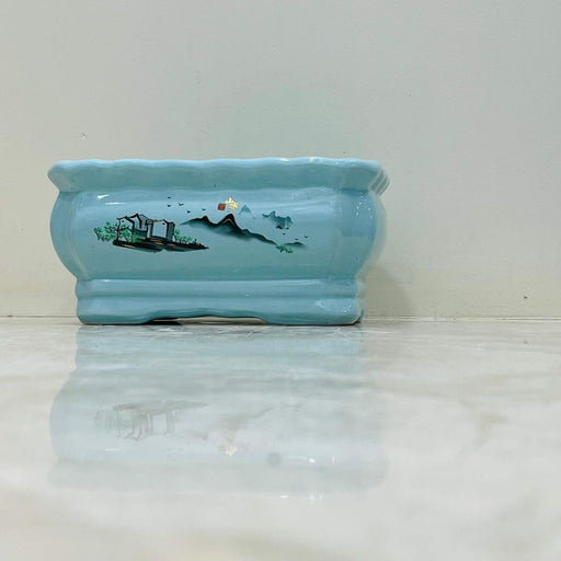 Hand-painted blue ceramic planter