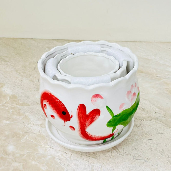 Koi Harmony ceramic planters with matching saucers