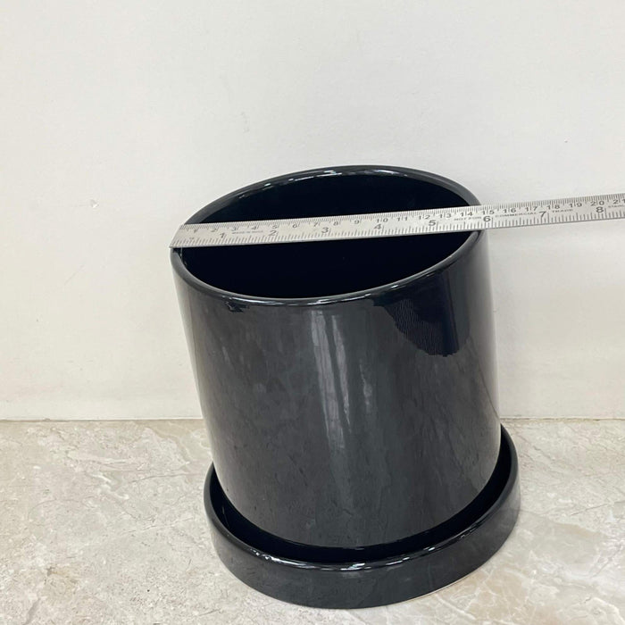 Large black plant pot with water drain saucer