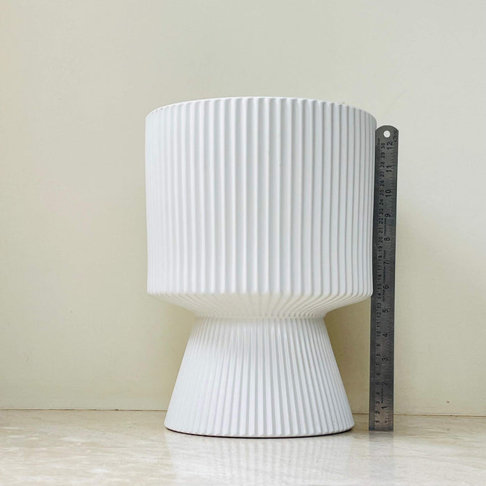 Modern white ceramic planter for indoor plants