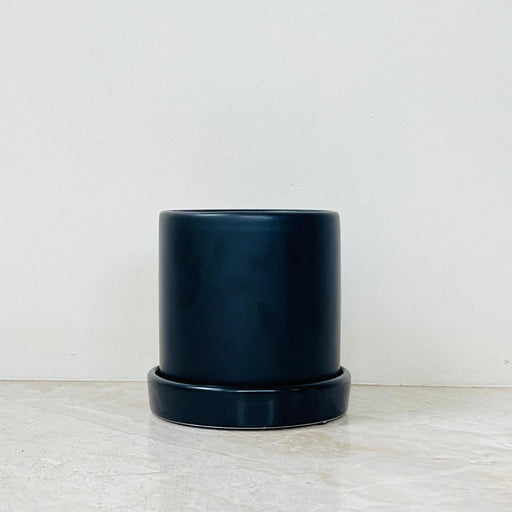 Matte black ceramic planter with saucer