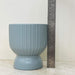 Matte grey-blue ceramic planter with ribbed texture