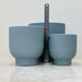 Medium ribbed ceramic plant pot in matte blue