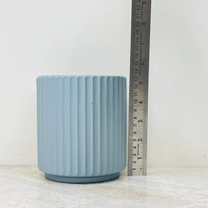 Matte light blue ribbed ceramic planter for home decor