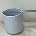 Minimalist blue ceramic planter with subtle texture