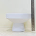 Modern white ceramic bowl planter with pedestal base