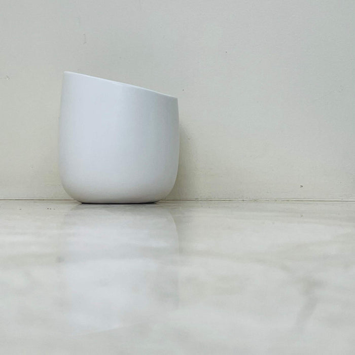 Modern asymmetrical white ceramic planter