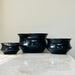 Set of 3 modern black ceramic pots with sleek design for indoor plants