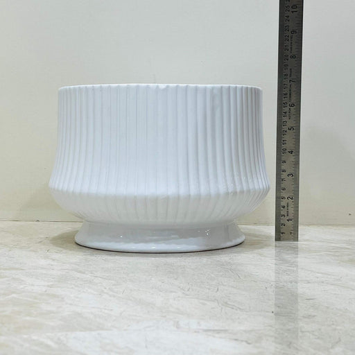 Modern ceramic plant pots with vertical ribbing