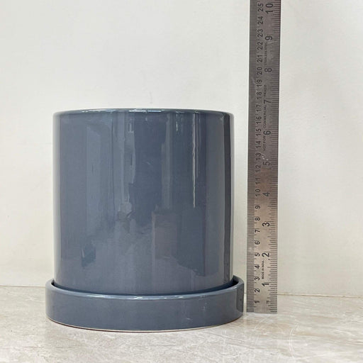 Modern cylindrical plant pot in dark grey