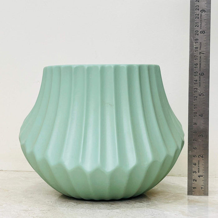 Modern decorative plant pot in mint green