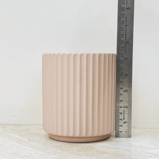 Matte beige cylindrical planter pot