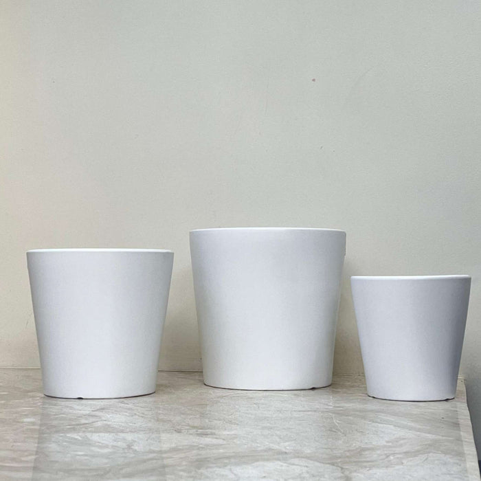 Matte finish white ceramic pots with tapered design