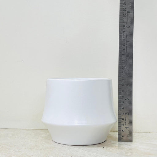 Modern white cylindrical plant pot