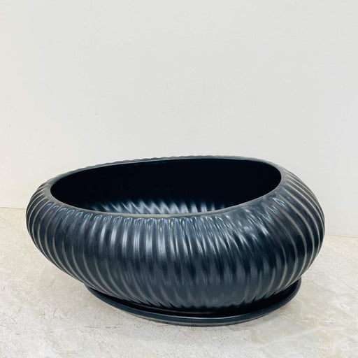 Oval matte black ceramic planter