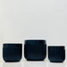 Set of ribbed black ceramic plant pots