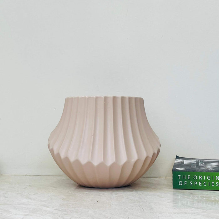 Modern minimalist ceramic planter with ribbed design