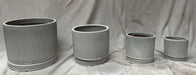 Ribbed cream ceramic planter set