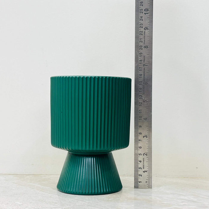 Ribbed green ceramic indoor planter