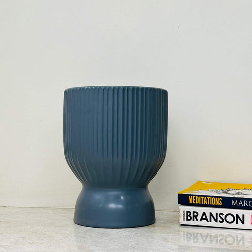 Ribbed hourglass ceramic planter in matte grey finish