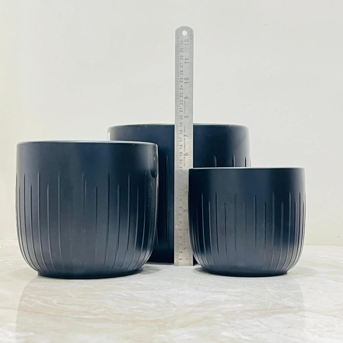 Matte black ceramic plant pot set for indoor use