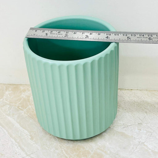 Modern vertical ribbed plant pot