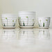 Elegant white ceramic pots with painted floral design