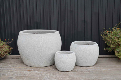 Textured white ceramic pots for plants