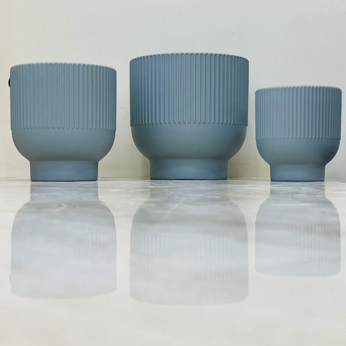 Set of modern blue ribbed ceramic planters