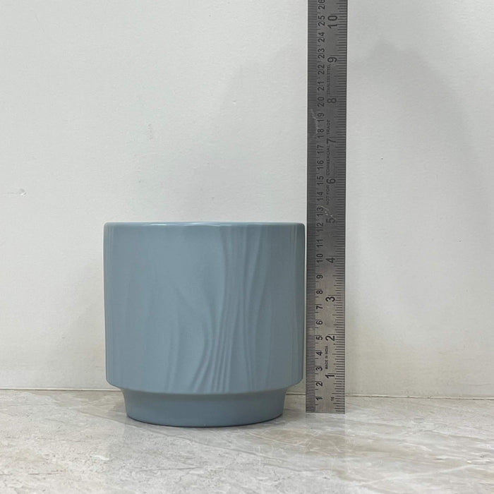 Small minimalist gray planter for indoor plants