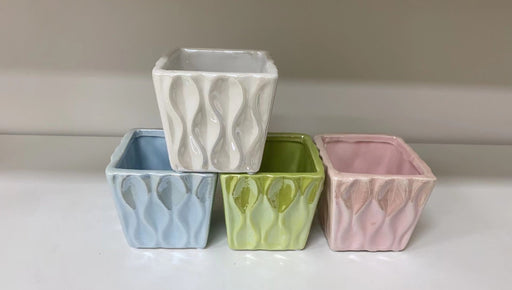 Square ceramic planter with wave design in pastel colors