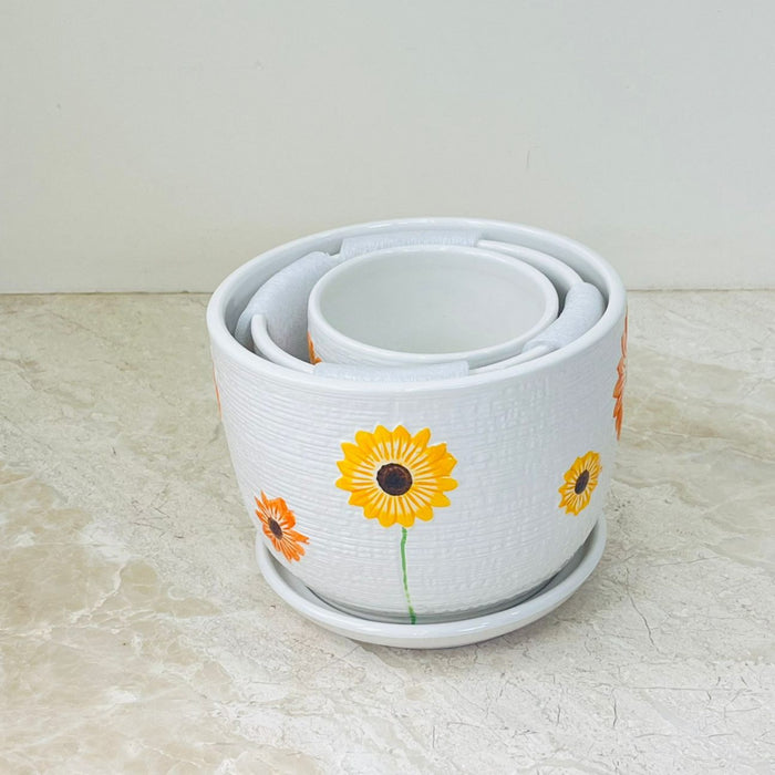 Sunflower Bliss ceramic pot set with orange and yellow flowers