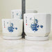 Set of ceramic planters with intricate blue floral patterns