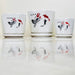 White ceramic pots with black and red koi fish and floral design