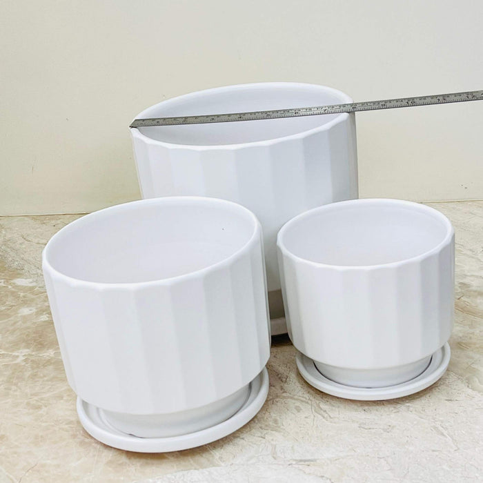 Set of ribbed ceramic planters with a modern look